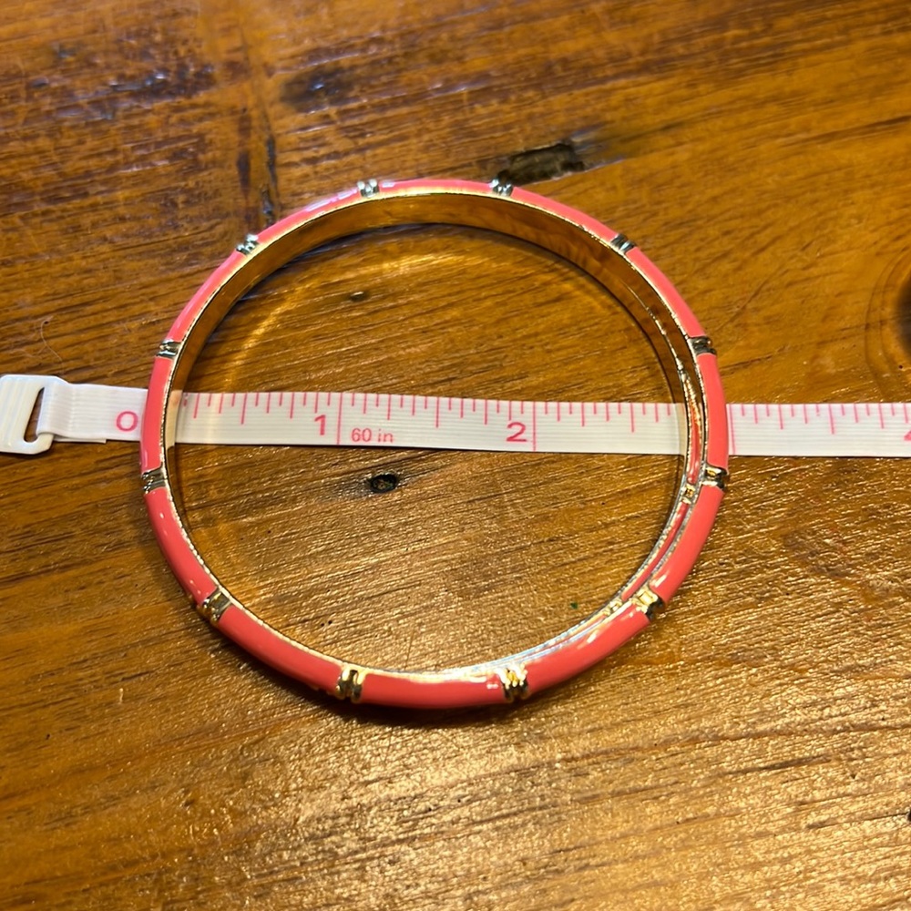 2 coral and gold bracelets